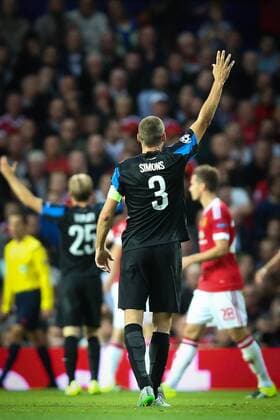 - MANCHESTER, UNITED KINGDOM: Club s Timmy Simons gestures during a soccer game between British club Manchester United ManU FC and Belgian team Club Brugge KV in Manchester, United Kingdom, Tuesday 18 August 2015, the first leg of the play-offs for the UEFA Champions League competition. BRUNOxFAHY x84379356x