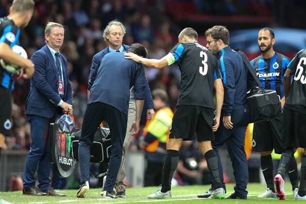 - MANCHESTER, UNITED KINGDOM: Club s Timmy Simons leaves the pitch after being injured during a soccer game between British club Manchester United ManU FC and Belgian team Club Brugge KV in Manchester, United Kingdom, Tuesday 18 August 2015, the first leg of the play-offs for the UEFA Champions League competition. BRUNOxFAHY x84379534x