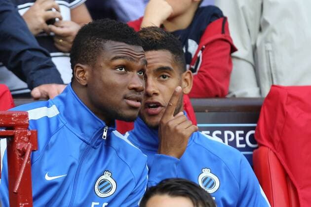 - MANCHESTER, UNITED KINGDOM: Club s Obbi Oulare and Club s Jean-Charles Castelletto pictured on the bench during a soccer game between British club Manchester United ManU FC and Belgian team Club Brugge KV in Manchester, United Kingdom, Tuesday 18 August 2015, the first leg of the play-offs for the UEFA Champions League competition. BRUNOxFAHY x84380086x