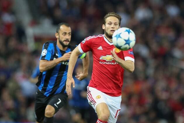 - MANCHESTER, UNITED KINGDOM: Club s Victor Vazquez Solsona and Manchester s Daley Blind fight for the ball during a soccer game between British club Manchester United ManU FC and Belgian team Club Brugge KV in Manchester, United Kingdom, Tuesday 18 August 2015, the first leg of the play-offs for the UEFA Champions League competition. BRUNOxFAHY x84380992x
