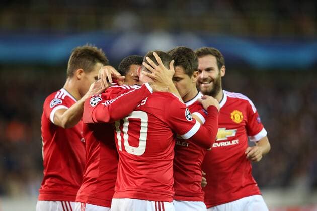- BRUGGE, BELGIUM: Manchester s Wayne Rooney (C) celebrates with his teammates after scoring during a soccer game between Belgian first league team Club Brugge KV and British club Manchester United ManU FC in Brugge, Wednesday 26 August 2015, the return game of the play-offs of the UEFA Champions League competition. Manchester United won the first leg 3-1. BRUNOxFAHY x84637935x
