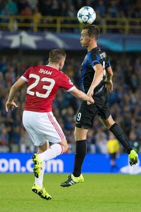 - BRUGGE, BELGIUM: Manchester s Luke Shaw and Club s Tom De Sutter fight for the ball during a soccer game between Belgian first league team Club Brugge KV and British club Manchester United ManU FC in Brugge, Wednesday 26 August 2015, the return game of the play-offs of the UEFA Champions League competition. Manchester United won the first leg 3-1. KURTxDESPLENTER x84638808x