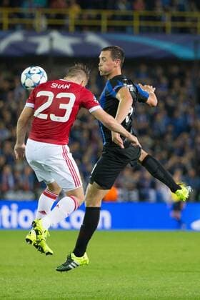 - BRUGGE, BELGIUM: Manchester s Luke Shaw and Club s Tom De Sutter fight for the ball during a soccer game between Belgian first league team Club Brugge KV and British club Manchester United ManU FC in Brugge, Wednesday 26 August 2015, the return game of the play-offs of the UEFA Champions League competition. Manchester United won the first leg 3-1. KURTxDESPLENTER x84638817x