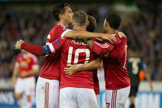 - BRUGGE, BELGIUM: Manchester s Wayne Rooney (C) celebrates with his teammates after scoring during a soccer game between Belgian first league team Club Brugge KV and British club Manchester United ManU FC in Brugge, Wednesday 26 August 2015, the return game of the play-offs of the UEFA Champions League competition. Manchester United won the first leg 3-1. KURTxDESPLENTER x84638968x