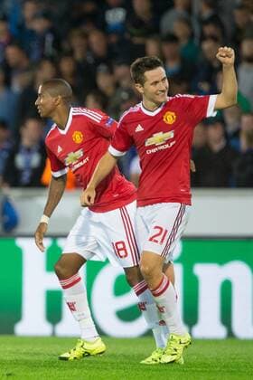 - BRUGGE, BELGIUM: Manchester s Ander Herrera (R) celebrates with his teammate Ashley Young after scoring during a soccer game between Belgian first league team Club Brugge KV and British club Manchester United ManU FC in Brugge, Wednesday 26 August 2015, the return game of the play-offs of the UEFA Champions League competition. Manchester United won the first leg 3-1. KURTxDESPLENTER x84639072x