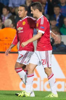 - BRUGGE, BELGIUM: Manchester s Ander Herrera (R) celebrates with his teammate Memphis Depay after scoring during a soccer game between Belgian first league team Club Brugge KV and British club Manchester United ManU FC in Brugge, Wednesday 26 August 2015, the return game of the play-offs of the UEFA Champions League competition. Manchester United won the first leg 3-1. KURTxDESPLENTER x84639074x