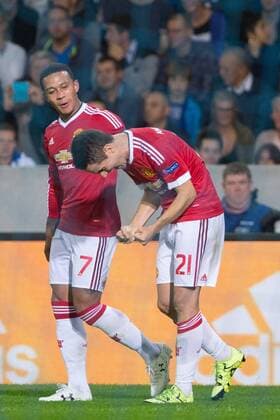 - BRUGGE, BELGIUM: Manchester s Ander Herrera (R) celebrates with his teammate Memphis Depay after scoring during a soccer game between Belgian first league team Club Brugge KV and British club Manchester United ManU FC in Brugge, Wednesday 26 August 2015, the return game of the play-offs of the UEFA Champions League competition. Manchester United won the first leg 3-1. KURTxDESPLENTER x84639108x