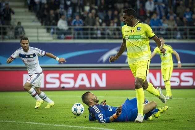 - GENT, BELGIUM: Lyon s goalkeeper Anthony Lopes and Gent s Renato Neto fight for the ball during the first game in the group stage of the Uefa Champions League competition, in group H, between Belgian first league soccer team KAA Gent and Olympique Lyon, in Gent, Wednesday 16 September 2015. JASPERxJACOBS x85280972x