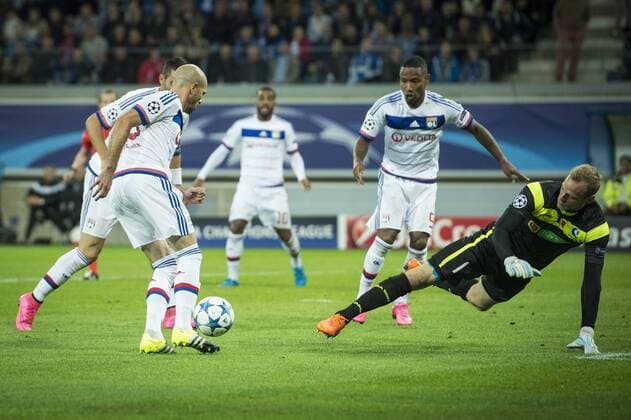 - GENT, BELGIUM: Lyon s Christophe Jallet and Gent s goalkeeper Matz Sels pictured in action during the first game in the group stage of the Uefa Champions League competition, in group H, between Belgian first league soccer team KAA Gent and Olympique Lyon, in Gent, Wednesday 16 September 2015. JASPERxJACOBS x85281376x