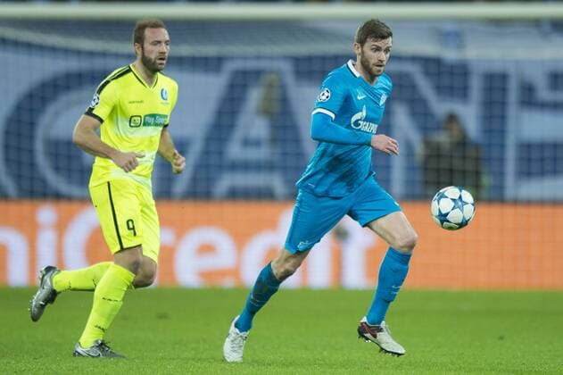 - GENT, BELGIUM: Gent s Laurent Depoitre and Zenit s Nicolas Lombaerts fight for the ball during a soccer game between Belgian team KAA Gent and Russian club FC Zenit Saint Petersburg, Wednesday 09 December 2015, in Gent, the sixth and last day of the group stage the UEFA Champions League competition, in group H. JASPERxJACOBS x88058411x