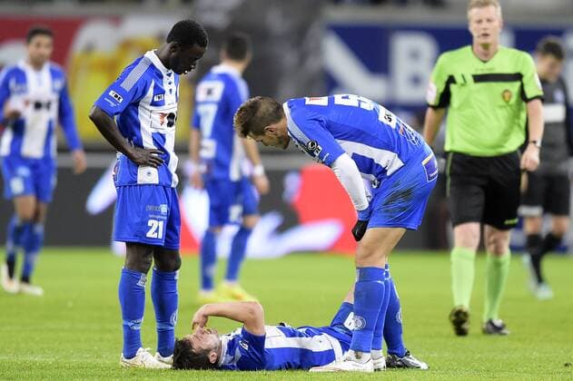 - GENT, BELGIUM: Gent s Brecht Dejaegere lies injured on the ground during the Jupiler Pro League match between KAA Gent and KRC Genk, in Gent, Sunday 07 December 2014, on day 18 of the Belgian soccer championship. YORICKxJANSENS x68706897x
