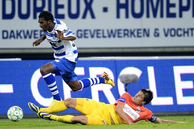 - GENT, BELGIUM: Gent s Renato Neto and Genk s Jelle Vossen fight for the ball during the Jupiler Pro League match between KAA Gent and KRC Genk, in Gent, Sunday 06 October 2013, on day 10 of the Belgian soccer championship. YORICKxJANSENS x47802146x