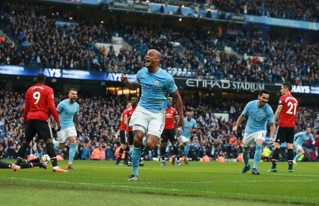 Vincent Kompany of Manchester City celebrates scoring the first goal during the premier league match at the Etihad Stadium, Manchester. Picture date 7th April 2018. Picture credit should read: Simon Bellis Sportimage EDITORIAL USE ONLY. No use with unauthorised audio, video, data, fixture lists, club league logos or live services. Online in-match use limited to 120 images, no video emulation. No use in betting, games or single club league player publications.