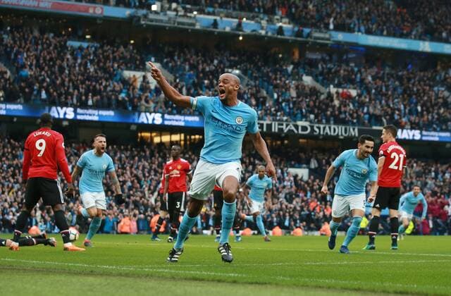 Vincent Kompany of Manchester City celebrates scoring the first goal during the premier league match at the Etihad Stadium, Manchester. Picture date 7th April 2018. Picture credit should read: Simon Bellis Sportimage EDITORIAL USE ONLY. No use with unauthorised audio, video, data, fixture lists, club league logos or live services. Online in-match use limited to 120 images, no video emulation. No use in betting, games or single club league player publications.