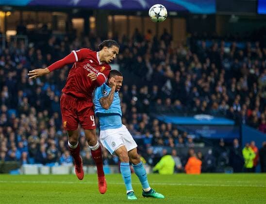 (180411) -- MANCHESTER, April 11, 2018 () -- Liverpool s Virgil van Dijk (L) vies with Manchester City s Raheem Sterling during the UEFA Champions League quarterfinal second leg soccer match between Manchester City and Liverpool in Manchester, Britain, on April 10, 2018. Liverpool won 5-1 on aggregate and advanced to the semifinal. () FOR EDITORIAL USE ONLY. NOT FOR SALE FOR MARKETING OR ADVERTISING CAMPAIGNS. NO USE WITH UNAUTHORIZED AUDIO, VIDEO, DATA, FIXTURE LISTS, CLUB LEAGUE LOGOS OR LIVE SERVICES. ONLINE IN-MATCH USE LIMITED TO 45 IMAGES, NO VIDEO EMULATION. NO USE IN BETTING, GAMES OR SINGLE CLUB LEAGUE PLAYER PUBLICATIONS.) (SP)BRITAIN-MANCHESTER-SOCCER-UEFA CHAMPIONS LEAGUE-MANCHESTER CITY VS LIVERPOOL Xinhua
