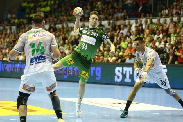 SC Magdeburg vs Frisch Auf Göppingen. Michael Damgaard (Magdeburg, 34) wirft Tor, Torschütze, erzielt Tor, Treffer, scores the goal, rechts Zarko Sesum (Göppingen, 15) SC Magdeburg vs Frisch Auf Göppingen, Handball, Ottostadt Magdeburg EHF Cup Finals 2018, Saison 2017 2018, 20.05.2018 Magdeburg Copyright: xEibner-Pressefotox EP_taeger