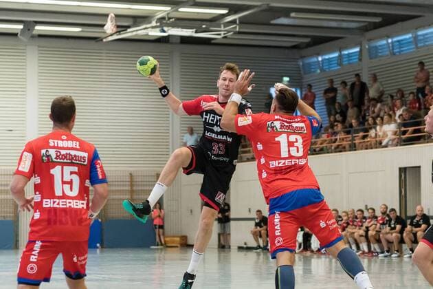 Nikolai Link (HC Erlangen 33), Benjamin Meschke (HBW Balingen-Weilstetten 13), HBW Balingen-Weilstetten vs. HC Erlangen , 24. Sparkassen-Cup , Handballl, DKB, Herren, 2.Bundesliga, 1.Bundesliga, Saison 18 19, GER, 27.07.2018, HBW Balingen-Weilstetten vs. HC Erlangen , 24. Sparkassen-Cup , Handballl, DKB, Herren, 2.Bundesliga, 1.Bundesliga, Saison 18 19, GER, 27.07.2018 Altensteig Copyright: xEIBNER WolfgangxFrankx EP_WFK