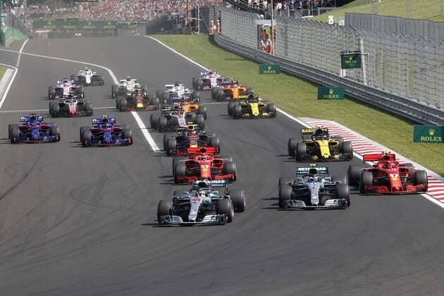 Motorsports: FIA Formula One World Championship WM Weltmeisterschaft 2018, Grand Prix of Hungary, Start, 44 Lewis Hamilton (GBR, Mercedes AMG Petronas Motorsport), 77 Valtteri Bottas (FIN, Mercedes AMG Petronas Motorsport), 7 Kimi Raikkonen (FIN, Scuderia Ferrari), 5 Sebastian Vettel (GER, Scuderia Ferrari), 55 Carlos Sainz jr. (ESP, Renault Formula One Team), Budapest Hungary