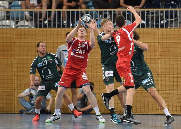Handball, Herren, Saison 2018 19, Mini-Turniner in der MBS-Arena, 1. VfL Potsdam - Füchse Berlin, Mattias Zachrisson (Nr. 21, Füchse Berlin), Jacques Caspar (Nr. 3, 1. VfL Potsdam), Christoph Reißky (Nr. 43, Füchse Berlin), Robin Hunt (Nr. 9, 1. VfL Potsdam), 03.08.18, Copyright: xMichaelxHundtx xMatthiasxKochx