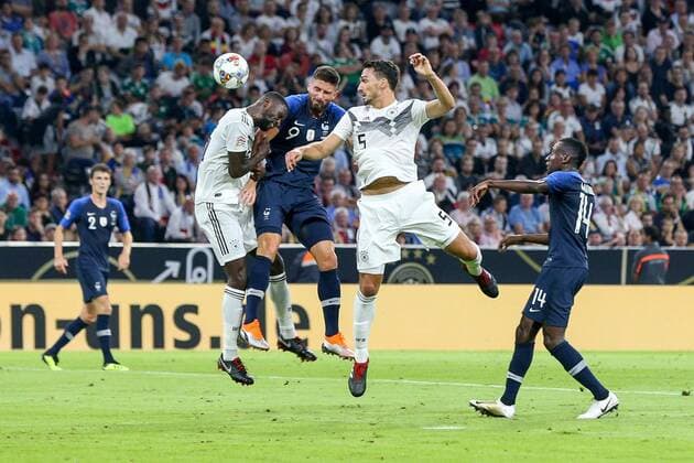 l-r: im Zweikampf, Aktion, mit Antonio Ruediger 16 (Deutschland), Olivier Giroud 9 (Frankreich), Mats Hummels 5 (Deutschland), Blaise Matuidi 14 (Frankreich), Deutschland vs. Frankreich, Fussball, UEFA Nations League, 06.09.2018, DFB regulations prohibit any use of photographs as image sequences and or quasi-video Muenchen Bayern Deutschland