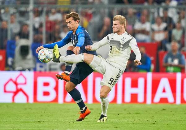 Germany - France, Soccer, Munich, September 06, 2018 Timo WERNER, DFB 9 compete for the ball, tackling, duel, header against Antoine GRIEZMANN, FRA 7 GERMANY - FRANCE Important: DFB regulations prohibit any use of photographs as image sequences and or quasi-video. Football Nations League, Season 2018 2019, September 06, 2018 Munich, Germany. Photographer: Peter Schatz MAGICS