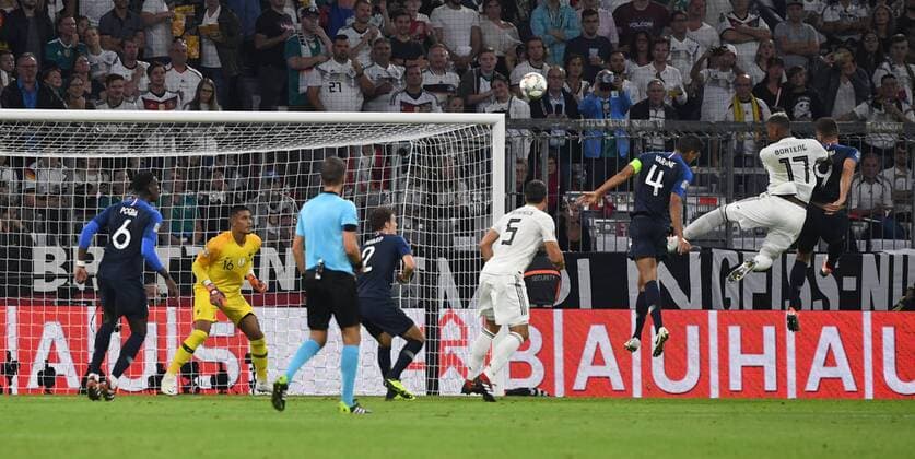 Fussball, Herren, Saison 2018 19, Nations League, Länderspiel in München, Deutschland - Frankreich, von rechts Olivier Giroud (Frankreich), Kopfball Jerome Boateng (Deutschland), Raphael Varane (Frankreich), 06.09.2018, Copyright: xMatthiasxKochx
