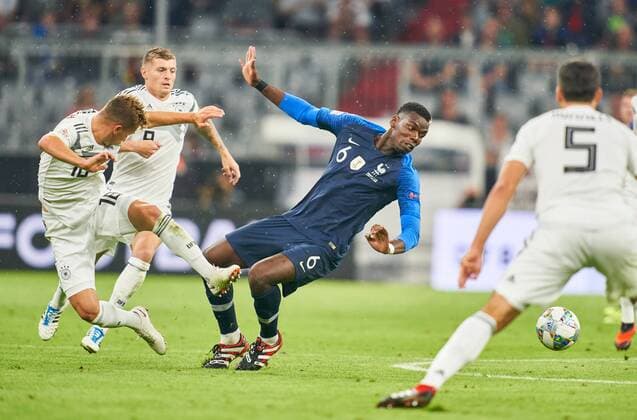 Germany - France, Soccer, Munich, September 06, 2018 Paul POGBA, FRA 6 compete for the ball, tackling, duel, header against Joshua KIMMICH, DFB 18 Toni KROOS, DFB 8 GERMANY - FRANCE 0-0 Important: DFB regulations prohibit any use of photographs as image sequences and or quasi-video. Football Nations League, Season 2018 2019, September 06, 2018 Munich, Germany. Photographer: Peter Schatz MAGICS