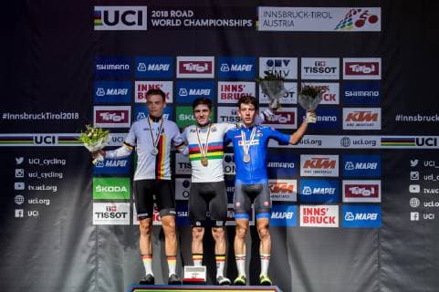 27.09.2018, Innsbruck, AUT, UCI Strassenrad WM 2018, Strassenrennen, Junioren, von Kufstein nach Innsbruck (138,4 km), im Bild Podium Marius Mayrhofer of Germany Silver medal Remco Evenepoel of Belgium Gold Medal Alessandro Fancellu of Italy Bronze Medal Celebration during the road race of the Junior Men from Kufstein to Innsbruck (138,4 km) of the UCI Road World Championships 2018. Innsbruck, Austria on 2018 09 27. Innsbruck