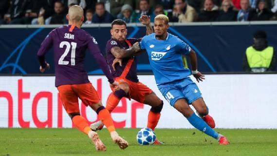 v.li.: David Josue Jimenez Silva (ManCity, 21), Nicolas Otamendi (ManCity, 30), Joelinton Cassio Apolinario de Lira (Joelinton, Hoffenheim, 34), Zweikampf, Spielszene, Duell, duel, tackle, tackling, Dynamik, Action, Aktion, Fussball, UEFA Champions League, TSG 1899 Hoffenheim - Manchester City FC,