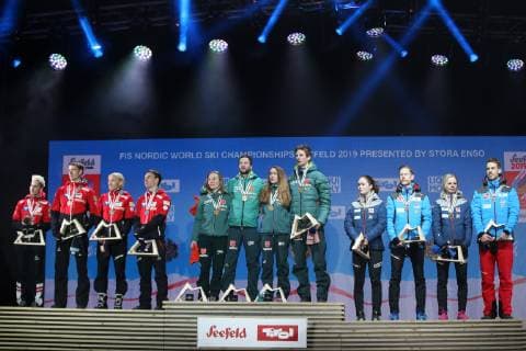 NORDIC SKIING - FIS Nordic World Ski Championships Seefeld 2019 SEEFELD,AUSTRIA,02.MAR.19 - NORDIC SKIING, Ski jumping Skispringen Ski nordisch - FIS Nordic World Ski Championships, Medal Plaza, award ceremony, mixed team event, normal hill. Image shows Eva Pinkelnig, Philipp Aschenwald, Daniela Iraschko-Stolz and Stefan Kraft (AUT), Katharina Althaus, Markus Eisenbichler, Juliane Seyfarth and Karl Geiger (GER) and Daniela Iraschko-Stolz, Eva Pinkelnig, Philipp Aschenwald and Stefan Kraft (AUT). GEPAxpictures xPhilippxBrem