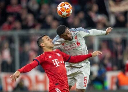13.03.2019, Allianz Arena, Muenchen, GER, UEFA CL, FC Bayern Muenchen vs FC Liverpool, Achtelfinale, Rueckspiel, im Bild v.l. Thiago Alcantara (FC Bayern), Georginio Wijnaldum (FC Liverpool) during the UEFA Champions League round of 16, 2nd leg match between FC Bayern Muenchen and FC Liverpool at the Allianz Arena in Muenchen, Germany on 2019 03 13. Muenchen