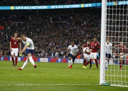 (190323) -- LONDON, March 23, 2019 -- England s Harry Kane (2nd L) scores from the penalty spot during the Euro 2020 qualifying Group A match between England and Czech Republic at Wembley Stadium in London, Britain on March 22, 2019. England won 5-0. FOR EDITORIAL USE ONLY. NOT FOR SALE FOR MARKETING OR ADVERTISING CAMPAIGNS. NO USE WITH UNAUTHORIZED AUDIO, VIDEO, DATA, FIXTURE LISTS, CLUB LEAGUE LOGOS OR LIVE SERVICES. ONLINE IN-MATCH USE LIMITED TO 45 IMAGES, NO VIDEO EMULATION. NO USE IN BETTING, GAMES OR SINGLE CLUB LEAGUE PLAYER PUBLICATIONS. ) (SP)BRITAIN-LONDON-FOOTBALL-EURO 2020 QUALIFYING-ENGLAND VS CZECH REPUBLIC MatthewxImpey