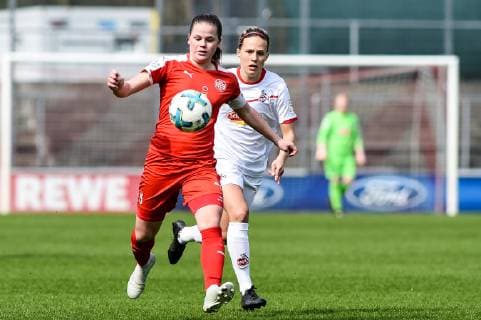 v. li.: Anna Julia Grassinger (SGS Essen II, 15), Meike Meßmer (FC Köln, 7), Zweikampf, Duell, duel, tackle, tackling, Dynamik, Action, Aktion, Fussball, 2. Frauen-Bundesliga, 1. FC Köln - SGS Essen II, DFB REGULATIONS PROHIBIT ANY USE OF PHOTOGRAPHS AS IMAGE SEQUENCES AND OR QUASI-VIDEO.