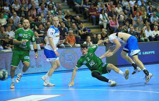 GER, DHB, 1.HBL, FUECHSE BERLIN VS. TVB Stuttgart 15.09.2019, Max Schmeling Halle, Berlin, GER, DHB, 1.HBL, FUECHSE BERLIN VS. TVB Stuttgart, DHB regulations prohibit any use of photographs as image sequences and or quasi-video im Bild Simon Ernst (Fuechse Berlin 2), Michael Mueller (Fuechse Berlin 25), Adam Loenn (Stuttgart 11), Elvar Asgeirsson (Stuttgart 4)