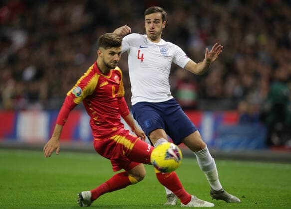 Harry Winks of England and Deni Hocko of Montenegro during the UEFA EURO, EM, Europameisterschaft,Fussball 2020 Qualifying match at Wembley Stadium, London. Picture date: 14th November 2019. Picture credit should read: Paul Terry Sportimage EDITORIAL USE ONLY. No use with unauthorised audio, video, data, fixture lists, club league logos or live services. Online in-match use limited to 120 images, no video emulation. No use in betting, games or single club league player publications. SPI-0315-0003