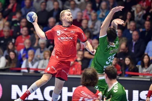 Julius Kuehn (MT Melsungen) beim Wurf; Marko Kopljar (Fuechse Berlin) (im Block) , GER, MT Melsungen - Fuechse Berlin, Handball, DHB Pokal, 03.12.2019, GER, MT Melsungen - Fuechse Berlin, Handball, DHB Pokal Maenner, 03.12.2019 Kassel Copyright: xSippel xEibner-Pressefotox EP_rsl