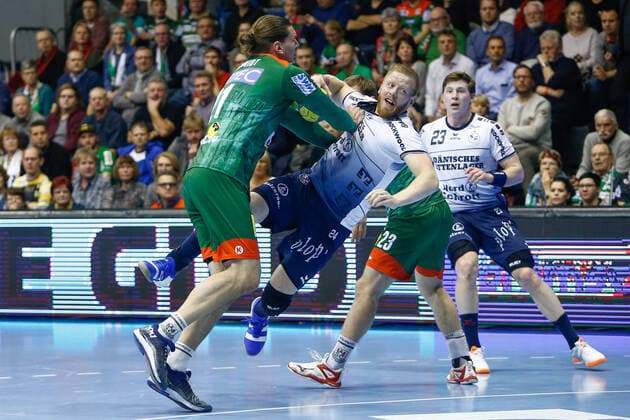 05.12.2019, xtgx, Handball Liqui Moly HBL, SC Magdeburg - SG Flensburg-Handewitt emspor, v.l. Erik Schmidt (Magdeburg, 21), Jim Gottfridsson (Flensburg, 24) wirft Tor, Torschuetze, erzielt Tor, Treffer, scores the goal, Zweikampf, Duell, Kampf, tackle GETEC Arena