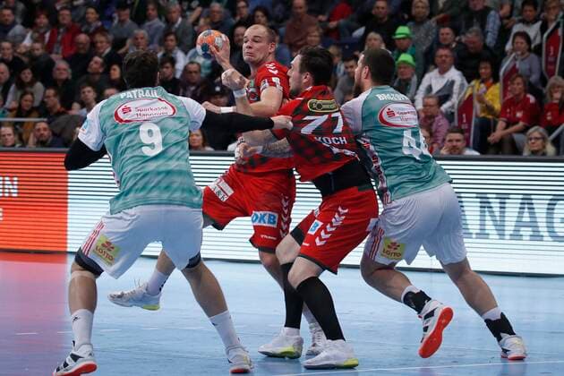 08.12.2019, TUI Arena, Hannover, Ligaspiel, 1. Bundesliga, TSV Hannover-Burgdorf vs Fuechse Berlin, im Bild Mait Patrail (9, Han.-Burgdorf) und Ilija Brozovic (44, Han.-Burgdorf) im Zweikampf mit Paul Drux (95, Berlin) und Johan Koch (77, Berlin) TSV Hannover-Burgdorf vs Fuechse Berlin
