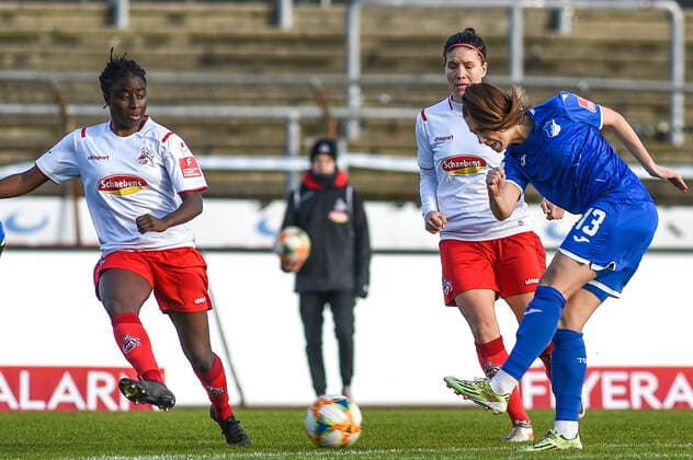v.li.: Eunice Beckmann (Köln, 11), Isabella Hartig (TSG, 13), Zweikampf, Duell, duel, tackle, tackling, Dynamik, Action, Aktion, 15.12.2019, Köln (Deutschland), Fussball, Flyeralarm Frauen-Bundesliga, 1. FC Köln - TSG Hoffenheim, DFB DFL REGULATIONS PROHIBIT ANY USE OF PHOTOGRAPHS AS IMAGE SEQUENCES AND OR QUASI-VIDEO.
