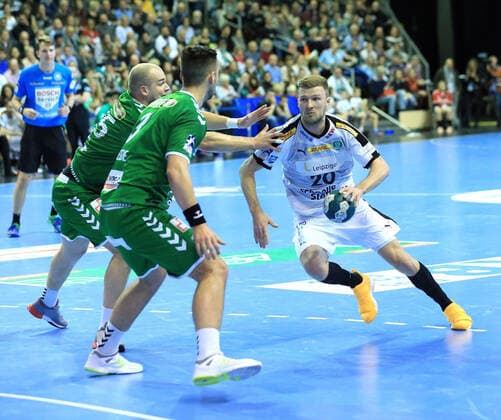GER, DHB, 1.HBL, FUECHSE BERLIN VS. SC DHfK LEIPZIG 26.12.2019, Max Schmeling Halle, Berlin, GER, DHB, 1.HBL, FUECHSE BERLIN VS. SC DHfK LEIPZIG, DHB regulations prohibit any use of photographs as image sequences and or quasi-video im Bild Paul Drux (Fuechse Berlin 95), Fabian Wiede (Fuechse Berlin 3), Philipp Weber (SC DHfK Leipzig 20)