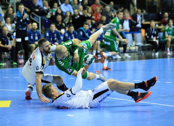 GER, DHB, 1.HBL, FUECHSE BERLIN VS. SC DHfK LEIPZIG 26.12.2019, Max Schmeling Halle, Berlin, GER, DHB, 1.HBL, FUECHSE BERLIN VS. SC DHfK LEIPZIG, DHB regulations prohibit any use of photographs as image sequences and or quasi-videoPaul Drux (Fuechse Berlin 95), , Alen Milosevic (SC DHfK Leipzig 34), Franz Semper (SC DHfK Leipzig 3)