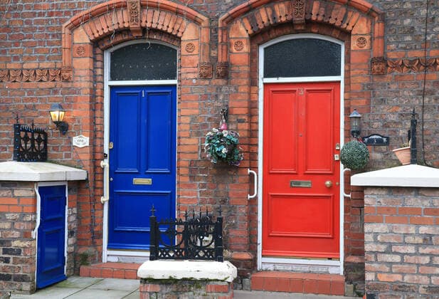 5th January 2020; Anfield, Liverpool, Merseyside, England; English FA Cup Football, Liverpool versus Everton; adjacent red and blue front doors on terraced houses in Wylva Road, a few hundred yards from the Kop - Strictly Editorial Use Only. No use with unauthorized audio, video, data, fixture lists, club league logos or live services. Online in-match use limited to 120 images, no video emulation. No use in betting, games or single club league player publications ActionPlus12201064 DavidxBlunsden