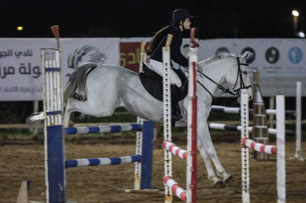 February 27, 2020, Gaza City, Gaza Strip, Palestinian Territory: A Palestinian horse rider on his horse jumps over a barrier during the first championship in jump barriers for the year 2020, on February 27, 2020 Middle East News - February 27, 2020 - ZUMAap3_ 97337264st Copyright: xMahmoudxAjjourx