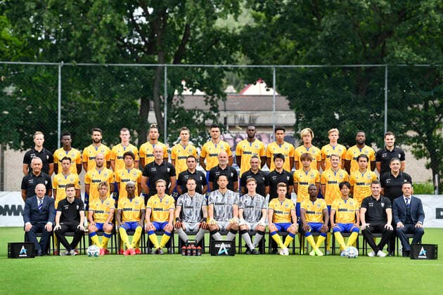 (upper row L-R) physiotherapist Par Vandenborne, Ibrahima Sankhon, Pol Garcia Tena, Christopher Durkin, Samy Mmaee, Wolke Janssens, Jorge Teixeira, Mory Konate, Nelson Balongo, Yuma Suzuki, Siebren Lathouwers, Duckens Nazon, physiotherapist Wouter Robijns, (middle row L-R) warehouseman Valere Stevens, Hamza Massoudi, Steve De Ridder, Keito Nakamura, keeper coach Jurgen De Braekeleer, assistant coach Carlos Perez Salvachua, head coach Kevin Muscat, physical coach Luciano Trani, analyst Yasuaki Osato, Ko Matsubara, Facundo Colidio, Santiago Colombatto, warehouseman Benny Liebens, (lower row L-R) delegate Romain Proesmans, doctor Jonas Massa, Tatsuya Ito, Jhonny Flora Barboza, Mathieu Troonbeeckx, goalkeeper Kenny Steppe, goalkeeper Daniel Yabuki Schmidt, Wim Vanmarsenille, Stan Van Dessel, Samuel Asamoah, Lee Seung-woo, doctor Peter Bollars and team manager Peter Delorge pose for the photographer, in marge of the 2020-2021 photoshoot of Belgian Jupiler Pro League club STVV Sint-Truidense Voetbalvereniging, Monday 27 July 2020 in Sint-Truiden. JOHANxEYCKENS x05830515x