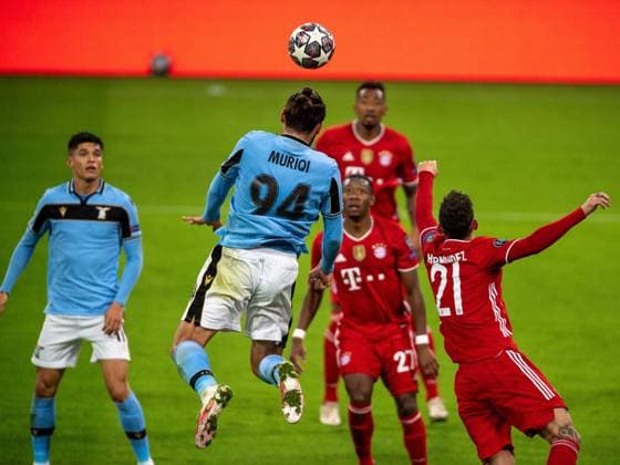 Vedat Muriqi Lazio Rom, 94), Lucas Hernandez (FC Bayern Muenchen, 21), GER, FC Bayern Muechen vs. Lazio Rom, Fussball, Champions League, Achtelfinale, Rueckspiel, Saison 2020 2021, 17.03.2021, DFB DFL regulations prohibit any use of photographs as image sequences and or quasi-video., GER, FC Bayern Muechen vs. Lazio Rom, Fussball, Champions League, Achtelfinale, Rueckspiel, Saison 2020 2021, 17.03.2021 Muenchen Copyright: xEIBNER SaschaxWaltherx EP_EER
