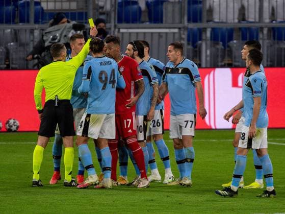 Gelbe Karte Jerome Boateng (FC Bayern Muenchen, 17), GER, FC Bayern Muechen vs. Lazio Rom, Fussball, Champions League, Achtelfinale, Rueckspiel, Saison 2020 2021, 17.03.2021, DFB DFL regulations prohibit any use of photographs as image sequences and or quasi-video., GER, FC Bayern Muechen vs. Lazio Rom, Fussball, Champions League, Achtelfinale, Rueckspiel, Saison 2020 2021, 17.03.2021 Muenchen Copyright: xEIBNER SaschaxWaltherx EP_EER