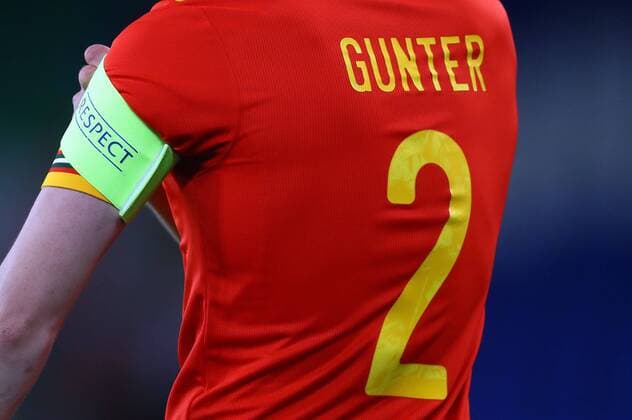 Mandatory Credit: Photo by Kieran McManus BPI Shutterstock (11832375ab) Chris Gunter of Wales adjusts the captains armband on his 100th cap Wales v Mexico, International Friendly, Länderspiel, Nationalmannschaft Football, The Cardiff City Stadium, Cardiff, UK - 27 Mar 2021 EDITORIAL USE ONLY No use with unauthorised audio, video, data, fixture lists, club league logos or live services. Online in-match use limited to 120 images, no video emulation. No use in betting, games or single club league player publications. Wales v Mexico, International Friendly, Football, The Cardiff City Stadium, Cardiff, UK - 27 Mar 2021 EDITORIAL USE ONLY No use with unauthorised audio, video, data, fixture lists, club league logos or live services. Online in-match use limited to 120 images, no video emulation. No use in betting, games or single club league player publications. Copyright: xKieranxMcManus BPI Shutterstockx 11832375ab