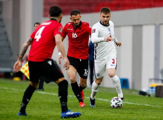 Mandatory Credit: Photo by Nikola Krstic BPI Shutterstock (11832717r) Luke Shaw of England and Sokol Cikalleshi of Albania Albania v England, FIFA World Cup, WM, Weltmeisterschaft, Fussball Qualifying Group I, Football, Arena Kombetare, Tirana, Albania - 28 Mar 2021 Albania v England, FIFA World Cup Qualifying Group I, Football, Arena Kombetare, Tirana, Albania - 28 Mar 2021 Copyright: xNikolaxKrstic BPI Shutterstockx 11832717r