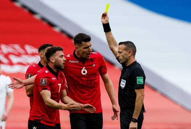 Mandatory Credit: Photo by Nikola Krstic BPI Shutterstock (11832717cc) Keidi Bare of Albania is shown a yellow card from referee Orel Grinfeld Albania v England, FIFA World Cup, WM, Weltmeisterschaft, Fussball Qualifying Group I, Football, Arena Kombetare, Tirana, Albania - 28 Mar 2021 Albania v England, FIFA World Cup Qualifying Group I, Football, Arena Kombetare, Tirana, Albania - 28 Mar 2021 Copyright: xNikolaxKrstic BPI Shutterstockx 11832717cc
