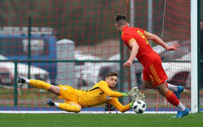 Mandatory Credit: Photo by Kieran McManus BPI Shutterstock (11836061a) Hubert Graczyk of England Under 18s saves a penalty from Ryan Viggars of Wales Under 18s Wales U18 v England U18, International Friendly, Länderspiel, Nationalmannschaft Football, The Leckwith Stadium, Cardiff, UK - 29 Mar 2021 EDITORIAL USE ONLY No use with unauthorised audio, video, data, fixture lists, club league logos or live services. Online in-match use limited to 120 images, no video emulation. No use in betting, games or single club league player publications. Wales U18 v England U18, International Friendly, Football, The Leckwith Stadium, Cardiff, UK - 29 Mar 2021 EDITORIAL USE ONLY No use with unauthorised audio, video, data, fixture lists, club league logos or live services. Online in-match use limited to 120 images, no video emulation. No use in betting, games or single club league player publications. Copyright: xKieranxMcManus BPI Shutterstockx 11836061a